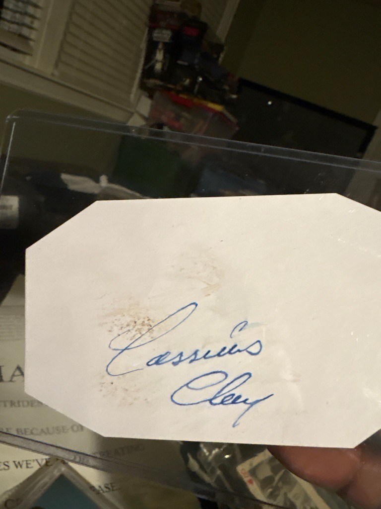 Muhammad Ali (signed as Cassius Clay)