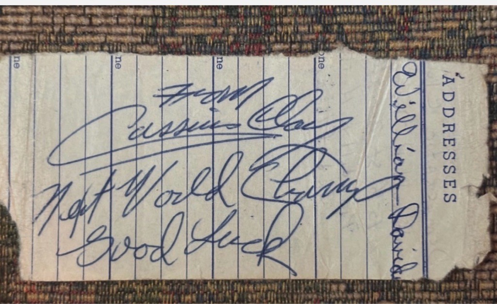 Muhammad Ali (signed as Cassius Clay)