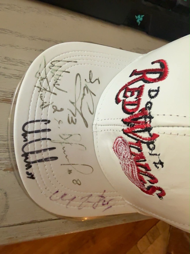 Multiple Detroit Red Wings Players (Multi-signed item including Steve Yzerman visible)