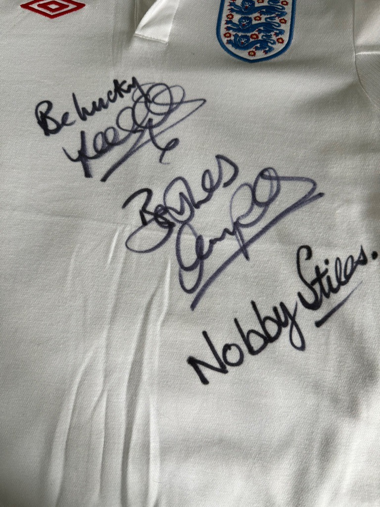 Multiple Signers (Sir Geoff Hurst, Nobby Stiles, and potentially others from the 1966 England World Cup winning team)