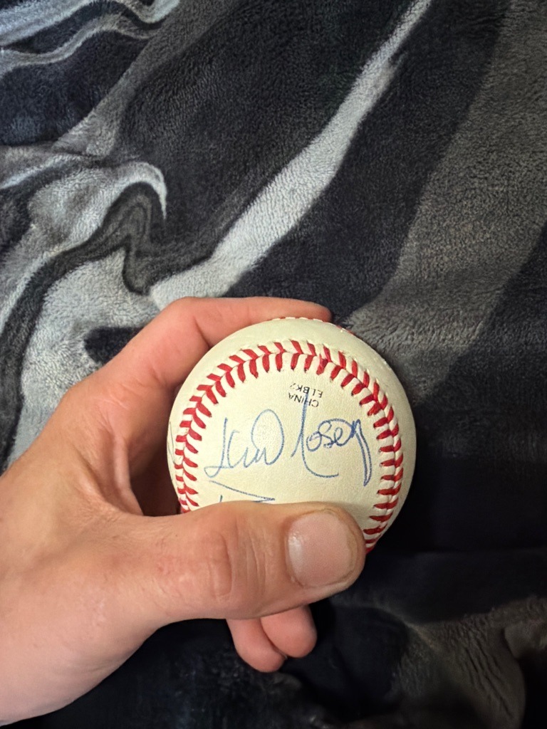 Lio Mosey (identified by inscription/signature context)