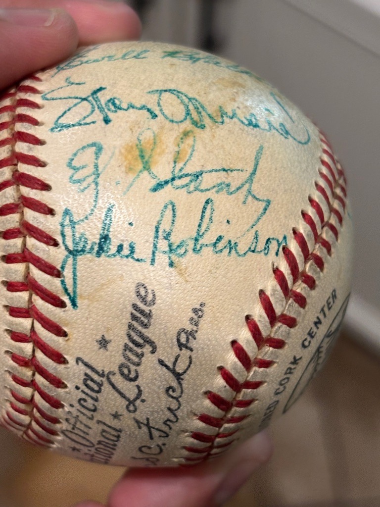 Jackie Robinson (with Stan Musial, Ewell Blackwell, and Gil Hodges)
