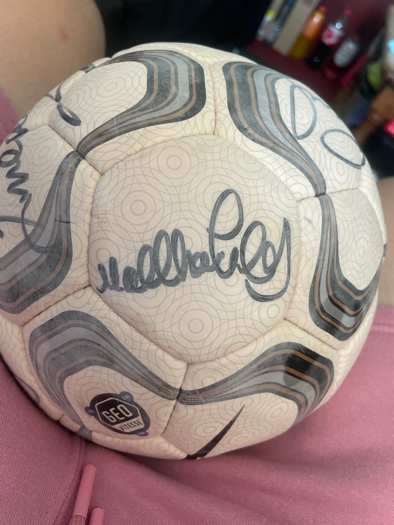 Ugo Ehiogu (likely among a squad-signed ball)